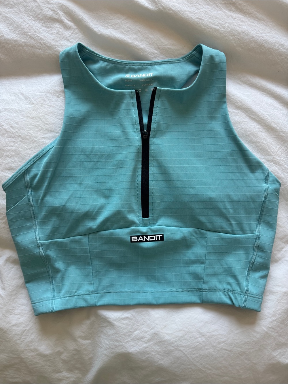 Bandit Women's Gridlock Zip Front Race Crop - Vintage Blue